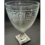A very large glass 19th century vase with engraved Greek key bands, with a fluted stem and a stepped