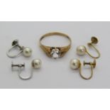 9ct colourless stone solitaire ring, together with two pairs of similar pearl earrings; one in