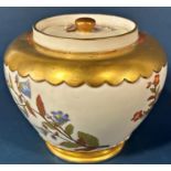 A Worcester porcelain oviform jar and cover with hand painted floral spray detail within gilded