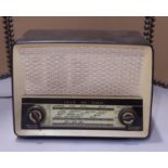 A vintage Ekco VHF/AM Bakelite cased mains radio model U319A