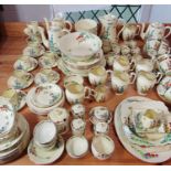 An extensive collection of Crown Staffordshire Hollyhock china including 4 tea and coffee pots,