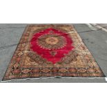 A good quality North East Persian Moud carpet, with an elaborate central spandrel of flowers on a