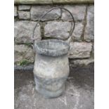 A small antique lead bucket/pail, with simple galvanised loop handle and banded detail, the main