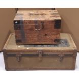 A vintage fibre and steel re-enforced cabin trunk with stitched leather handles together with a