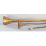 A long brass copper coaching horn 125cm, another similar shorter horn 91cm and a military baton with