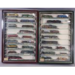 Two display cases by 'Picture Pride' containing 29 N gauge static railway models of worldwide