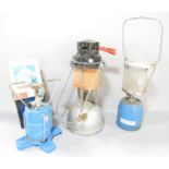 A Vapalux paraffin Hurricane Lamp, a Camping Gaz lamp and S 200 burner, together with six gas