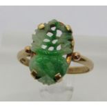 14ct jade ring with carved and pierced detail, size O/P, 3g