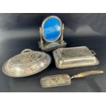 A selection of silver plated table ware including a three piece tea service, two tureens with