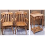 A pair of modern stained beechwood Windsor lathe back kitchen elbow chairs together with a small