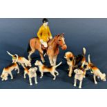 A collection of Beswick (mainly hunting related effects) including 7 hounds, 3 foxes and a huntsman