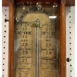 Admiral Fitzroy barometer with an oxford style oak framework with printed back panel and fittings