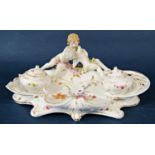 19th century continental porcelain ink stand, the two inkwells within a shaped framework with floral