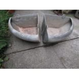 A pair of heavy gauge galvanised cast iron wall mounted corner bow fronted stable troughs 56 cm wide
