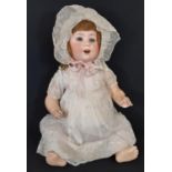 Early 20th century German bisque head character baby doll circa 1914 by Cuno & Otto Dressel, with