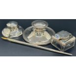 A silver lot consisting of three inkwells in various sizes and styles and a further writing quill