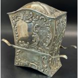 A silver Sedan chair trinket box in floral decoration, London, 1899, maker Samuel Jacob, weight 6.6