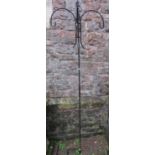 A simple coated ironwork ground stake with hooks suitable for hanging baskets or bird feeders,