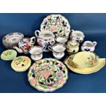 A collection of Poole table ware including tureens, plates in various sizes, cups, saucers, etc