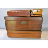 An early 20th century leather travel vanity wallet with original contents, a 19th century mahogany