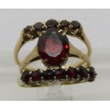 Three garnet rings; two 9ct examples, 3.7g total and one silver example