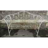 A contemporary but weathered painted aluminium two seat garden bench with scrolled arms, arched back