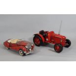 2 tin plate model vehicles comprising Rolls Royce and (boxed) David Brown tractor, both approx