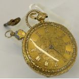 18ct gold gentleman's dress watch with engraved gilt dial and engine turned casework, dated