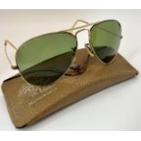 A pair of vintage Ray Ban sunglasses by Bausch & Lomb Ltd with original case and literature