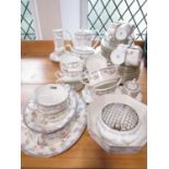 An extensive Coalport Trellis Rose pattern dinner tea and coffee service comprising graduated