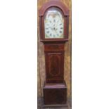 A regency mahogany longcase clock, the case with string banded inlay, the arched hood with column