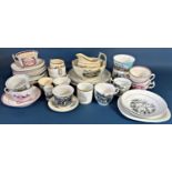 A collection of 19th century printed mugs, cups and plates showing Whitby Abbey, rural houses, Welsh