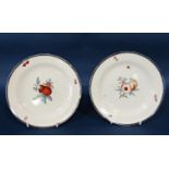 Two 18th century hand painted creamware dishes showing fruit and insects together with a further