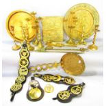 A mixed selection of brass ware, including candlesticks, horse brasses, trays , skimmer, etc