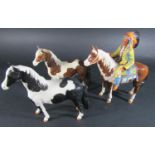 A Beswick model of a mounted Indian model number 1391 together with a Beswick skewbald pinto pony