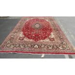 A Persian Kashan rug in pure wool, tones of red, blue and brown, approx. 335 x 295 cm