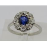 Early 20th century platinum sapphire and diamond cluster ring, sapphire 0.50ct approx, ring head 1.