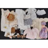 A large boxful of vintage dolls clothes, shoes, and early 20th baby gowns, white cotton adult