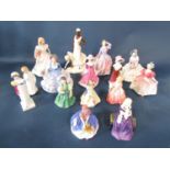 A collection of contemporary porcelain figures including Doulton Affection, Sophie, Amy, Sweeting,