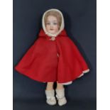 Early 20th century German bisque head doll by Armand Marseille, with closing blue eyes, open mouth