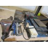 A group of hand tools and related effects to include a large bench vice, cased socket accessories,