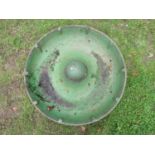 A vintage painted and weathered Mexican hat style cast iron pig feeding trough, stamped Bratley &