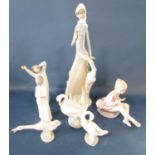 A Lladro figure of a slender girl and a fawn, two Lladro Geese and a figure of a young boy yawning