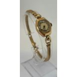 A vintage ladies wristwatch with 9ct gold case and bracelet, 16 grams (with movement removed)