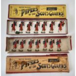 2 x Britains set 69 Pipers of the Scots Guards, in original Whisstock boxes; Yellow label box houses