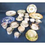 A collection of 19th century tea bowls and miscellaneous coffee cans, three divisional hors d'