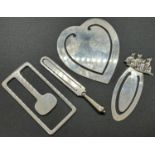 A sterling silver collection of money clips in various designs and shapes inducing a heart shaped