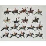 An assorted collection of 17 Britains mounted cavalry figures, including a bugler (17)