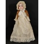 Early 20th century German shoulder-head doll by Armand Marseille circa 1905 with closing brown eyes,