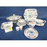 A large quantity of Mason Regency pattern tableware comprising dinner plates, tureens, tea cups,